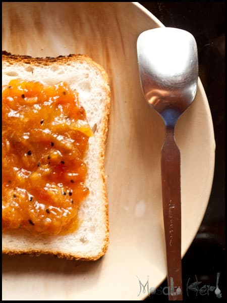Tropical mix fruit jam on a slice of bread