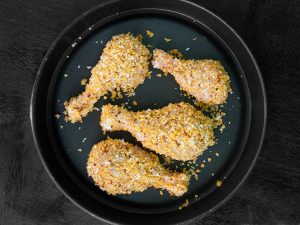 Golden Baked Chicken Drumsticks with Corn Flakes Coconut and Chili Flakes