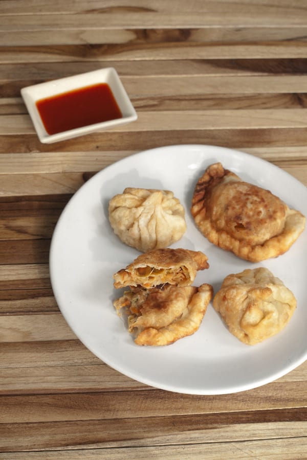 Momos Recipe - Fried Momos with Veg Cheese filling www.masalaherb.com #stepbystep #recipe