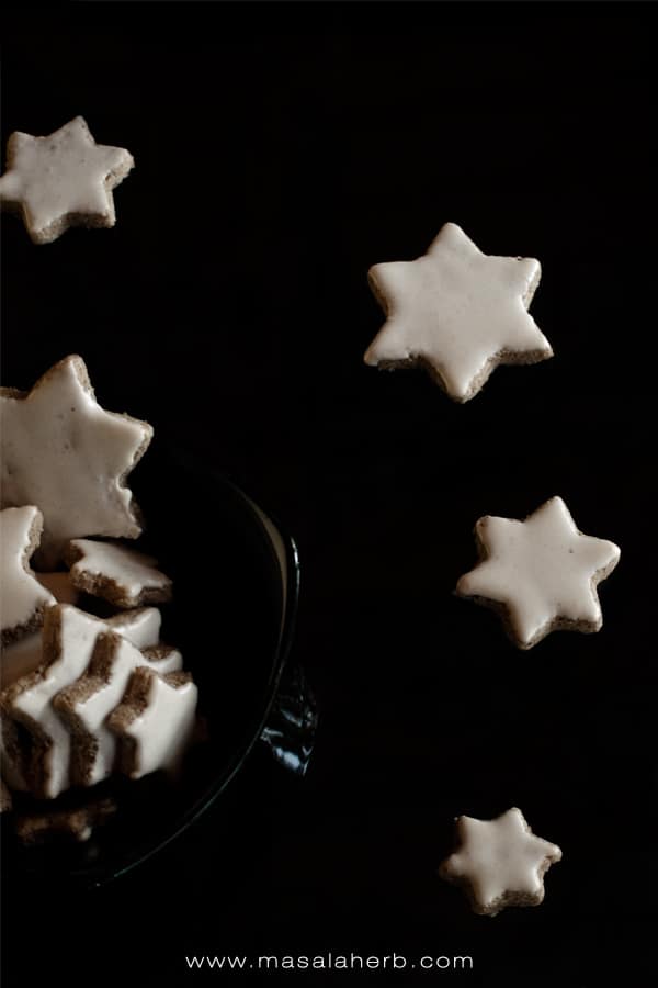 Zimtsterne Recipe - German Cinnamon Star Cookies [Gluten-Free]. perfect cookies to surprise your loved ones this winter. Tasty, moist, lightly spiced and enriched with cinnamon + almonds. Get the step by step instructions with pictures for the Zimtsterne. www.Masalaherb.com #cinnamon #stars #cookies #christmas #masalaherb