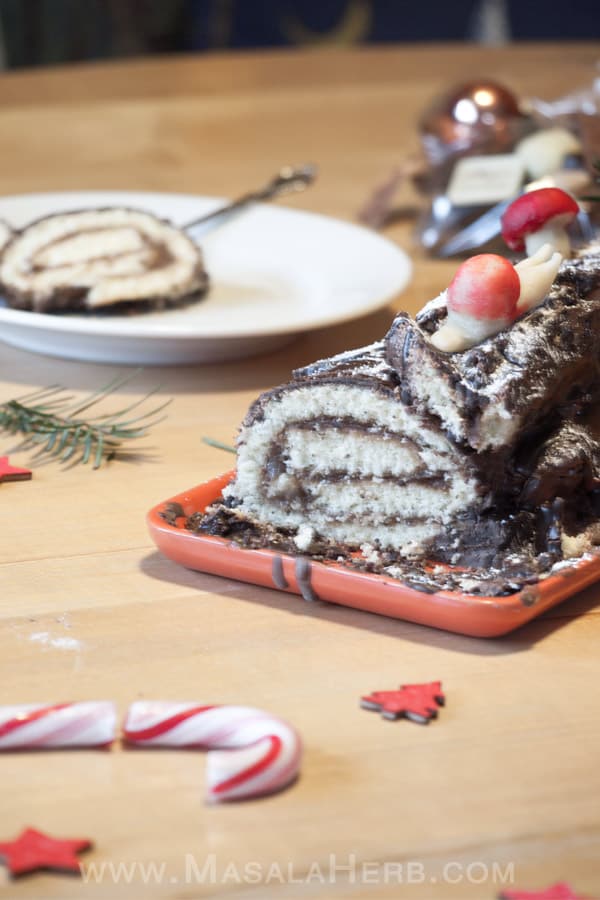 Easy Yule Log Recipe - Christmas Bûche de Noël Cake [French] with step by step picture tutorial to make the yule log easily at home. decorate the buche the noel to your liking with icing sugar and marzipan almond paste. This is our french family recipe! www.MasalaHerb.com #christmas #cake #yulelog #french