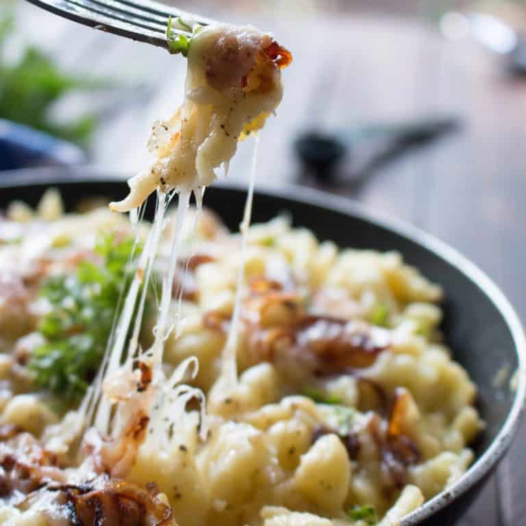 strings of cheese on spaetzle