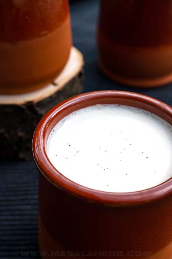 vanilla flavored yogurt in a clay pot