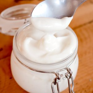 white japanese mayonnaise in jar and spoon