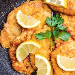 chicken piccata served up with lemon slices