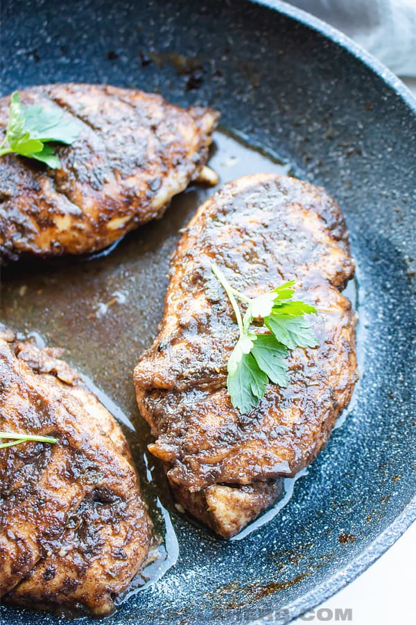 close up balsamic chicken in a pan