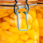 close up of canned peaches