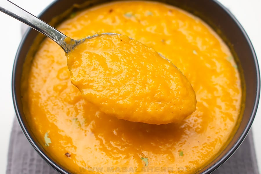 Spiced Carrot Ginger Soup in a spoon