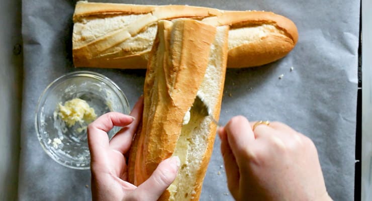 fill bread with garlic butter