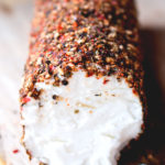 close up cheese log with spices
