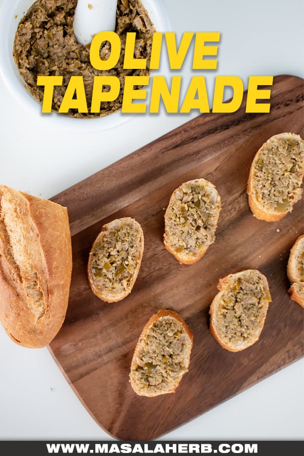 olive tapenade over baguette slices