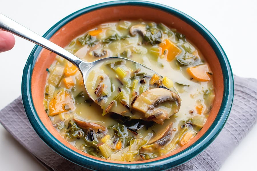 wild rice soup with mushroom in a spoon