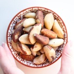 a small bowl with brazil nuts