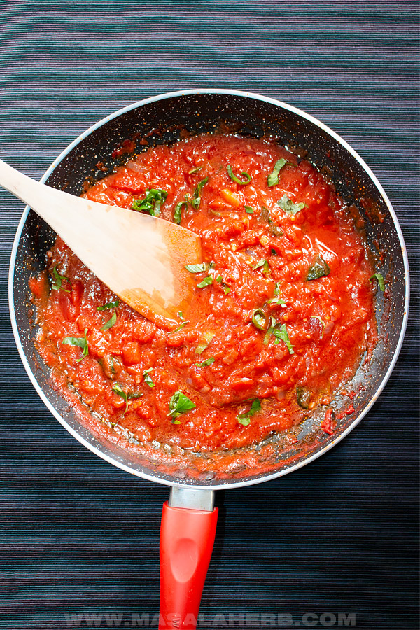 basil tomato pomodoro sauce in a skillet top down view