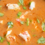 close up of lobster in bisque soup