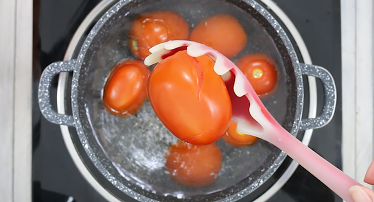 blanch tomatoes, place into ice water when done