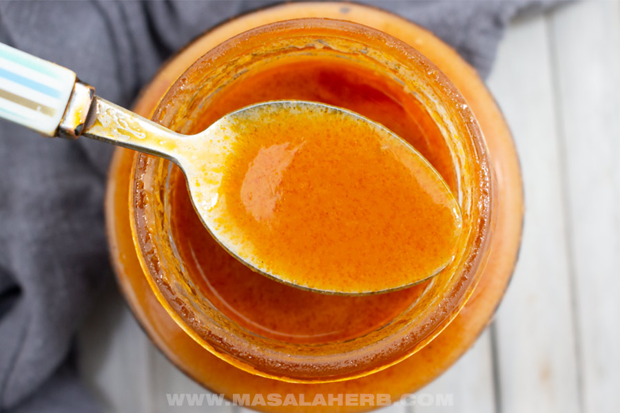 buffalo sauce in a spoon close up