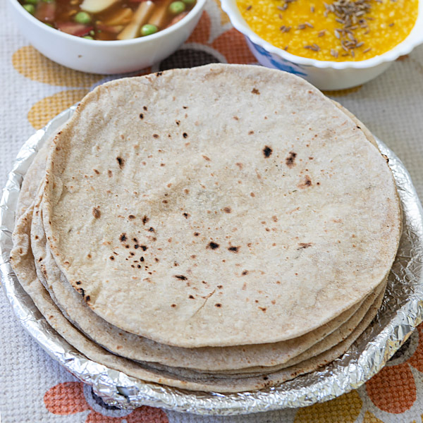 Indian iron tawa or pan to prepare chapati, roti on white