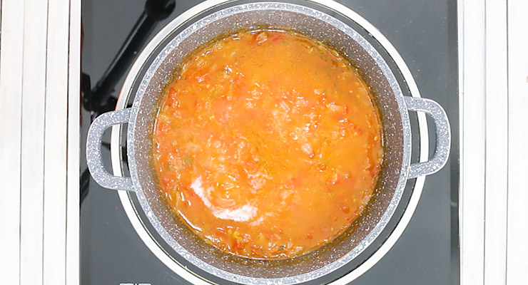 reduce and cook stewed tomatoes