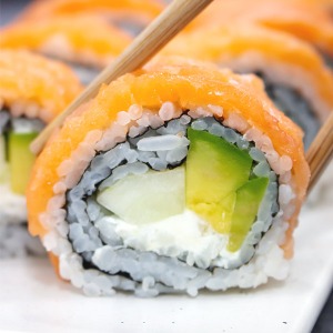 sushi with salmon, cream cheese, avocado and cucumber