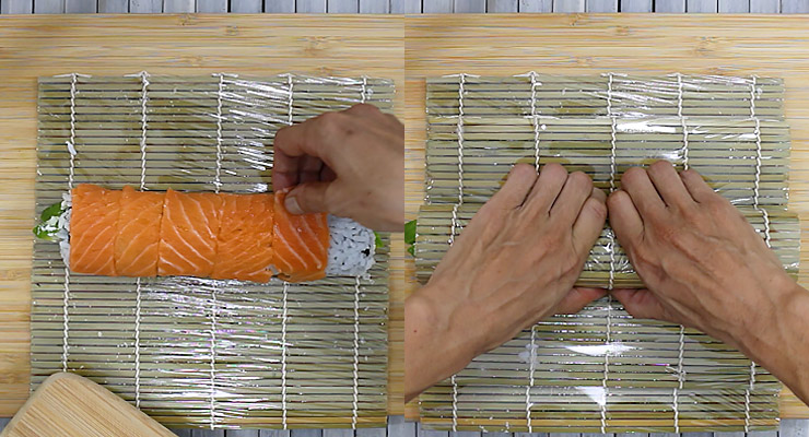 arrange salmon slices over sushi and press down to mold roll