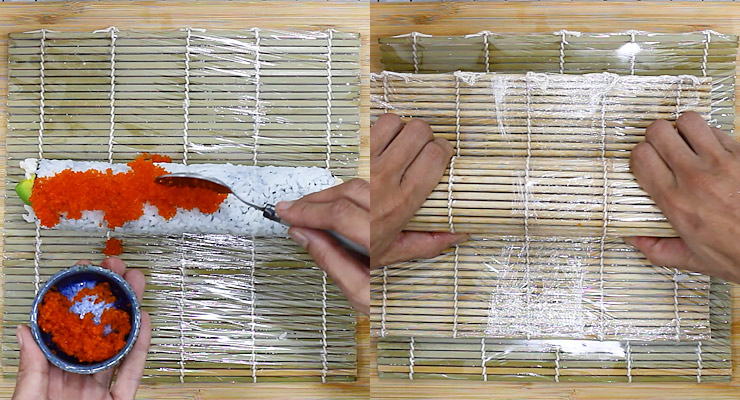 Arrange tobiko fish roe over sushi roll and shape it with a 2nd sushi mat so that tobiko sticks to the roll.