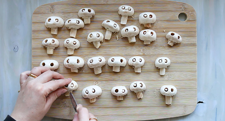 create skulls out of mushroom halves