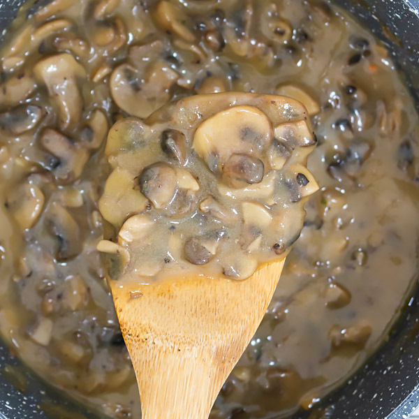 button mushrooms sliced in gravy