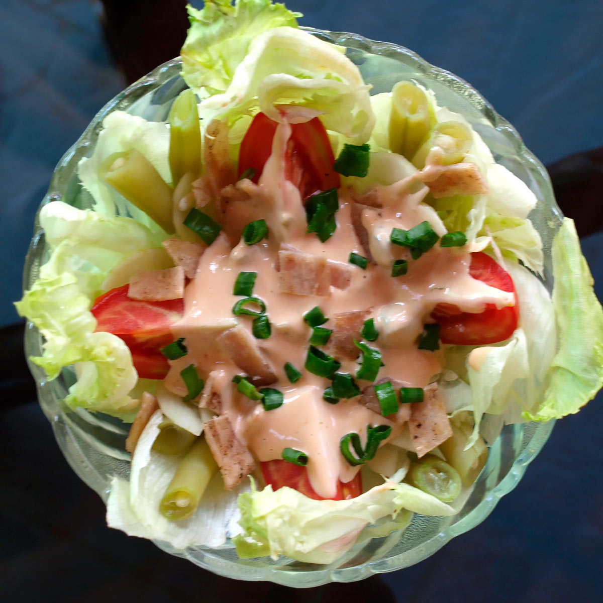 Iceberg Salad with Thousand Island Dressing top down view