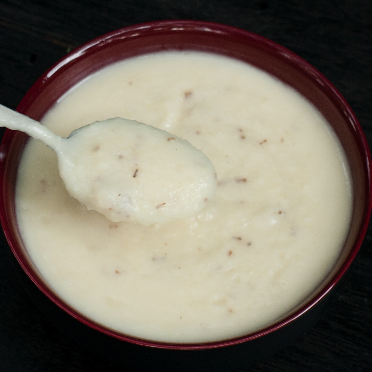 Kohlrabi Potato Purée in a spoon and bowl