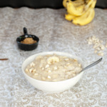 Semolina Porridge with Banana and sugar in the background