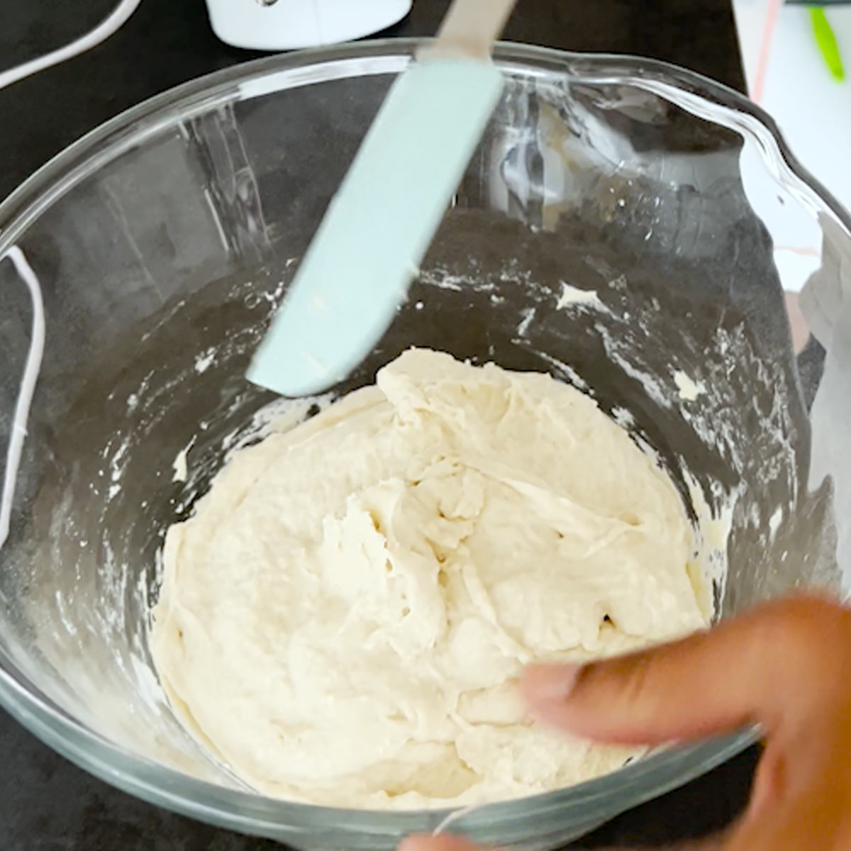 scrape the sides of your bowl to assemble the baguette dough in the center of the bowl