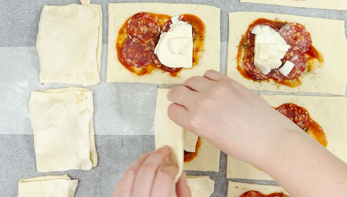 folding dough over filling