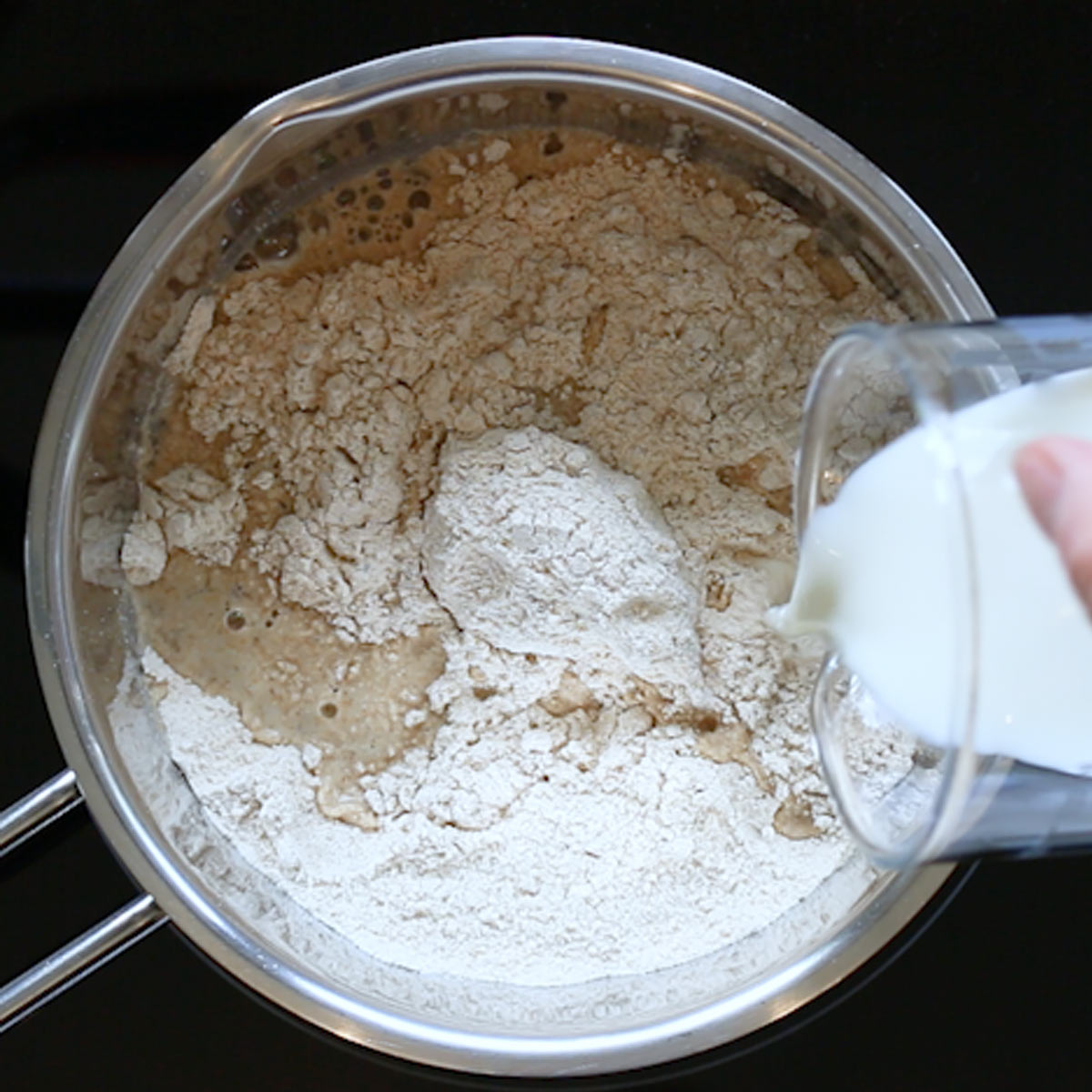 pouring milk to tsampa flour