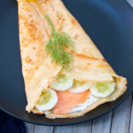 folded savory crepes with salmon cucumber cream cheese and dill