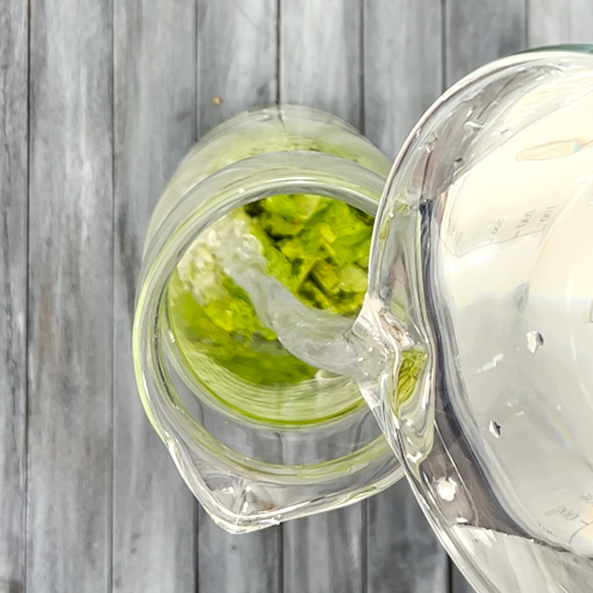 pour water over mint in a bottle