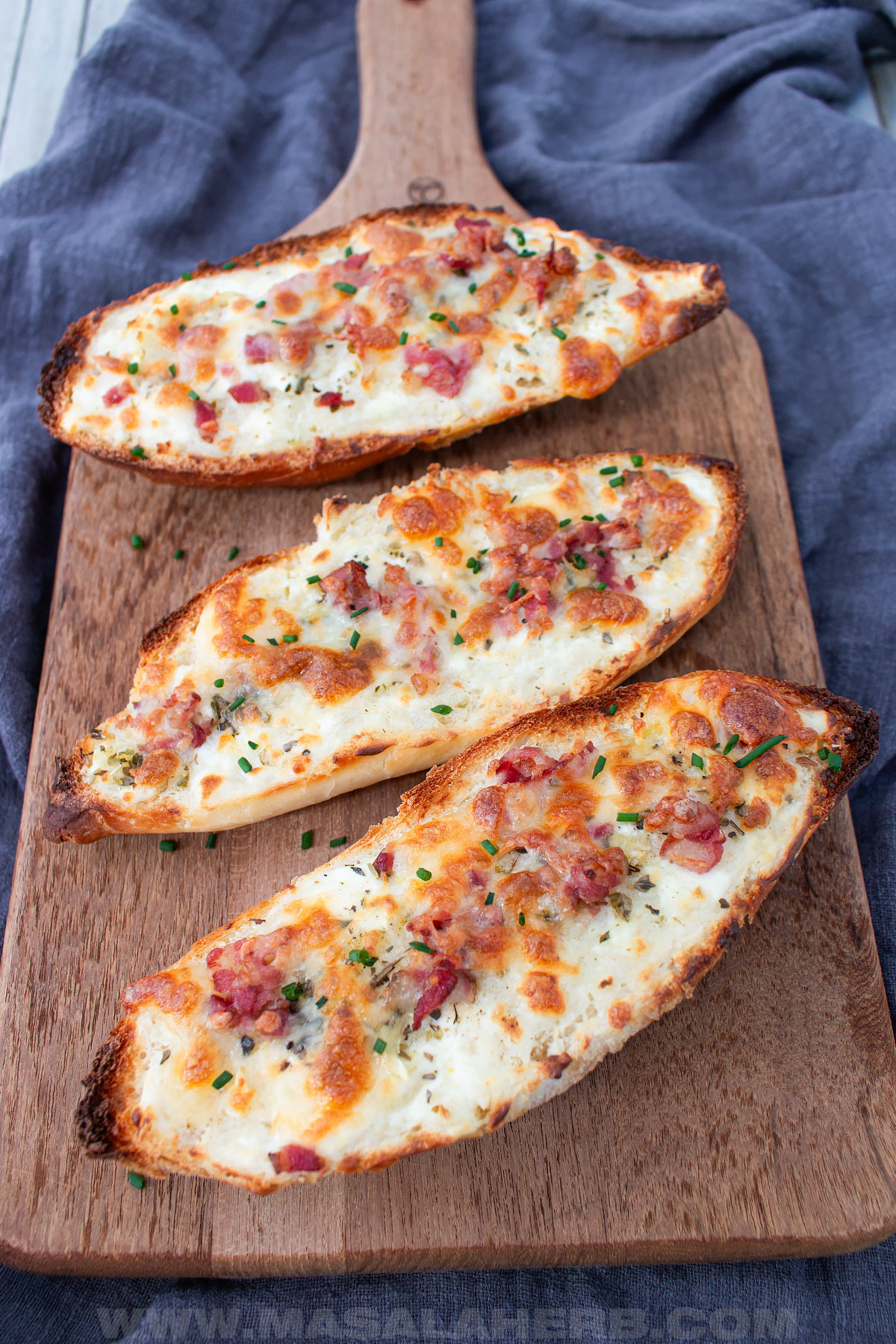 homemade french bread pizza with bacon