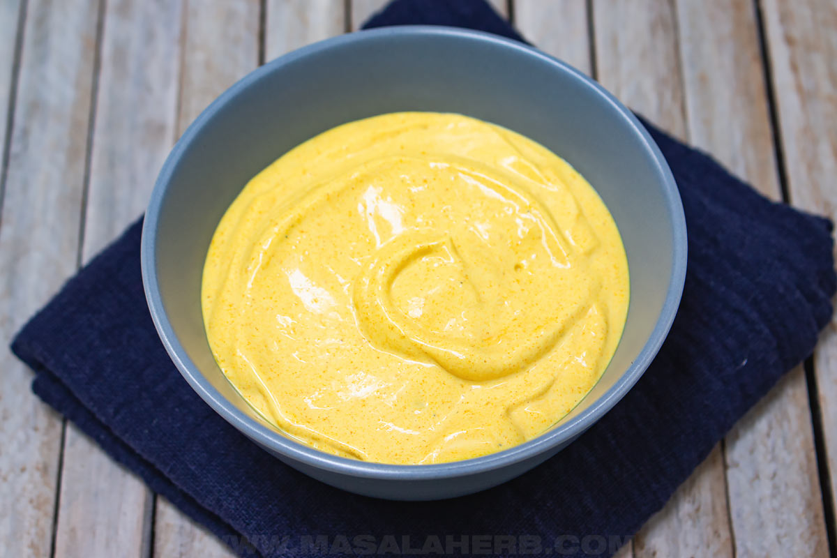 Yellow curry Mayonnaise whipped in a bowl