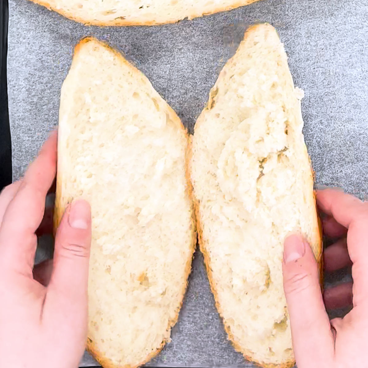 place french bread face up on a baking sheet