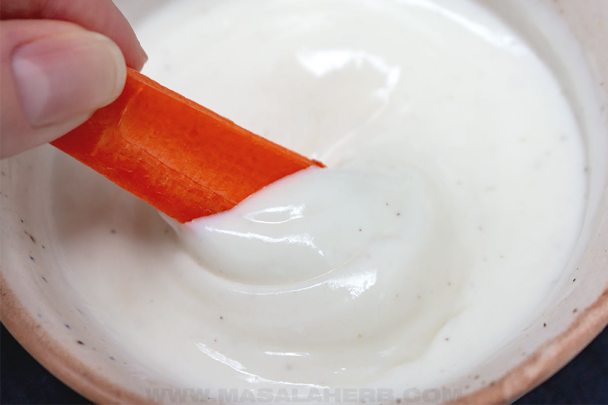 close up of dipping lemon yogurt sauce