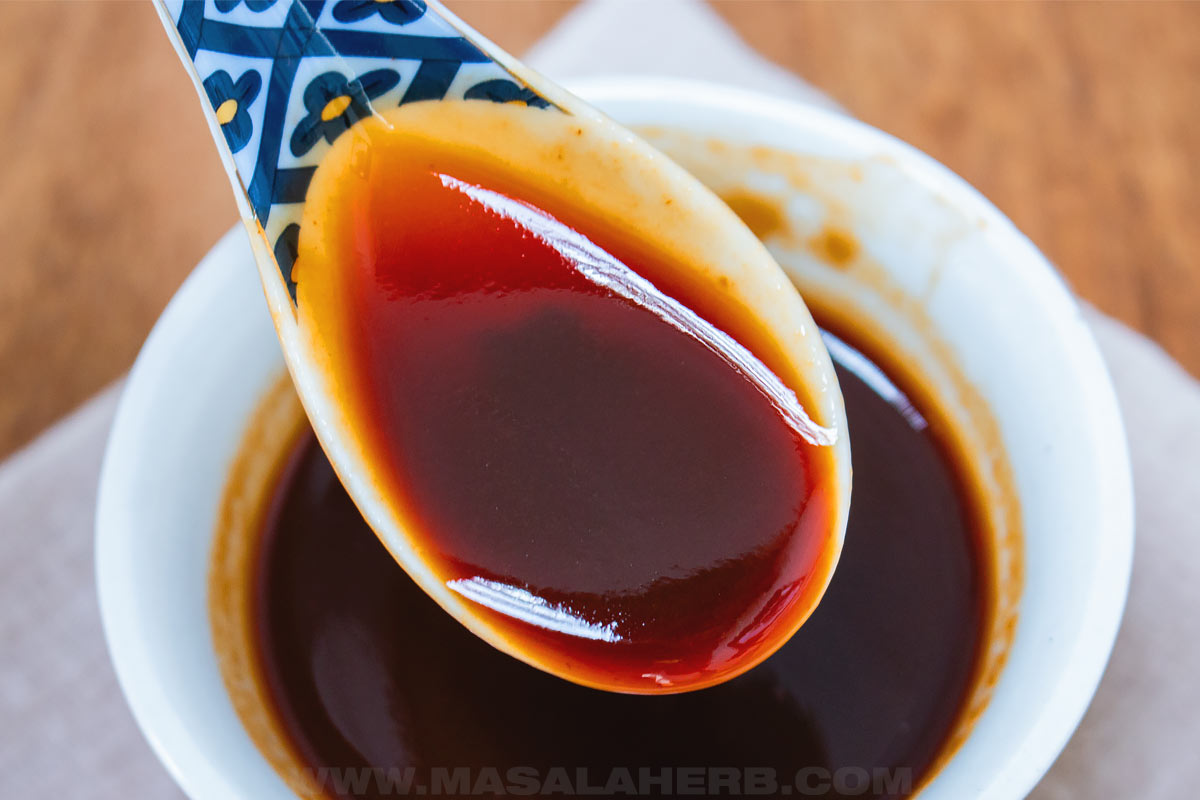 stir fry sauce in a spoon close up