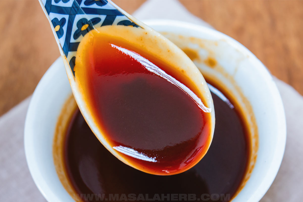 stir fry sauce in a spoon close up