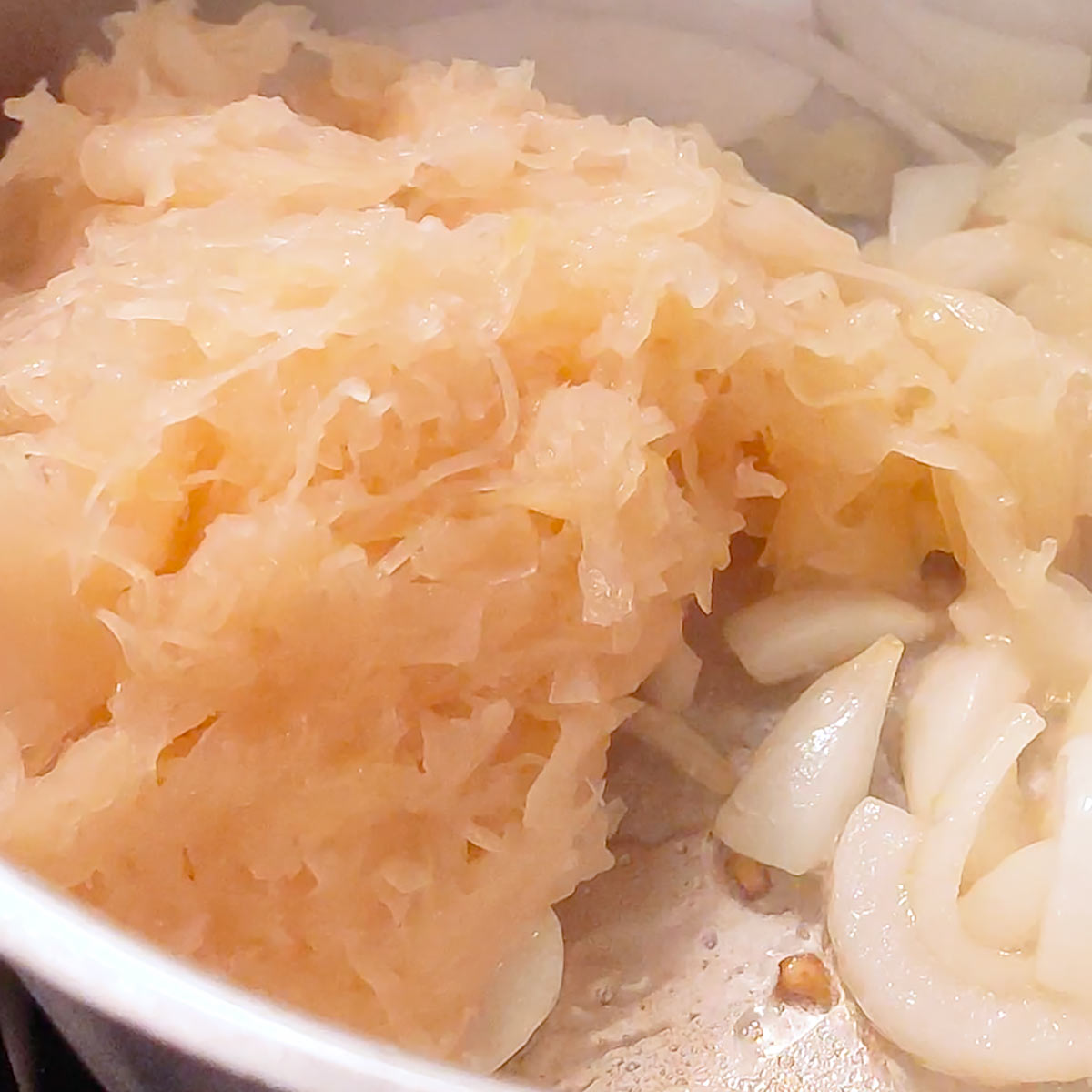 stir sauerkraut into the pan