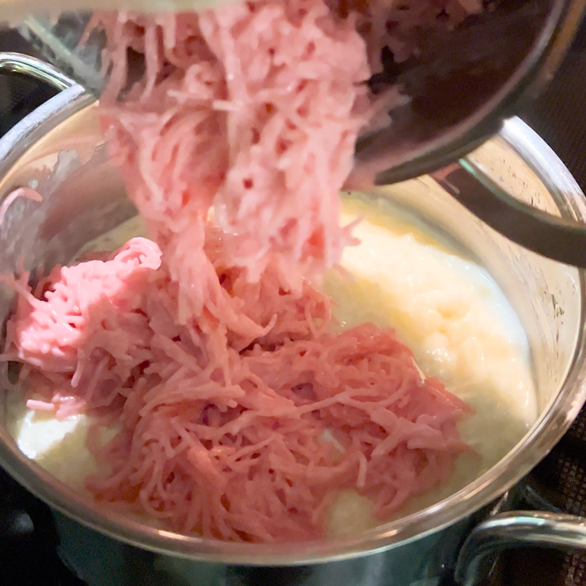 pink vermicelli added to rice