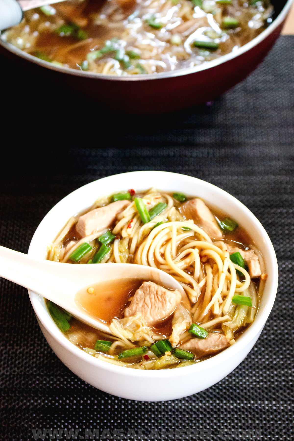 A bowl of Chinese chicken noodle soup