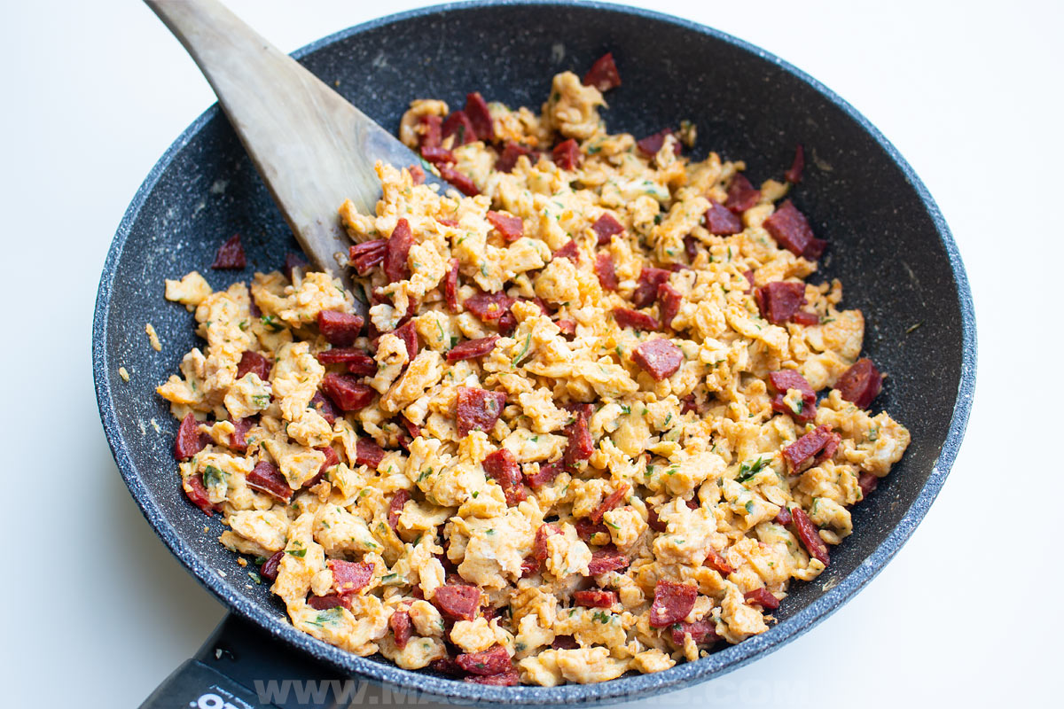 eggs scrambled with cured sausage