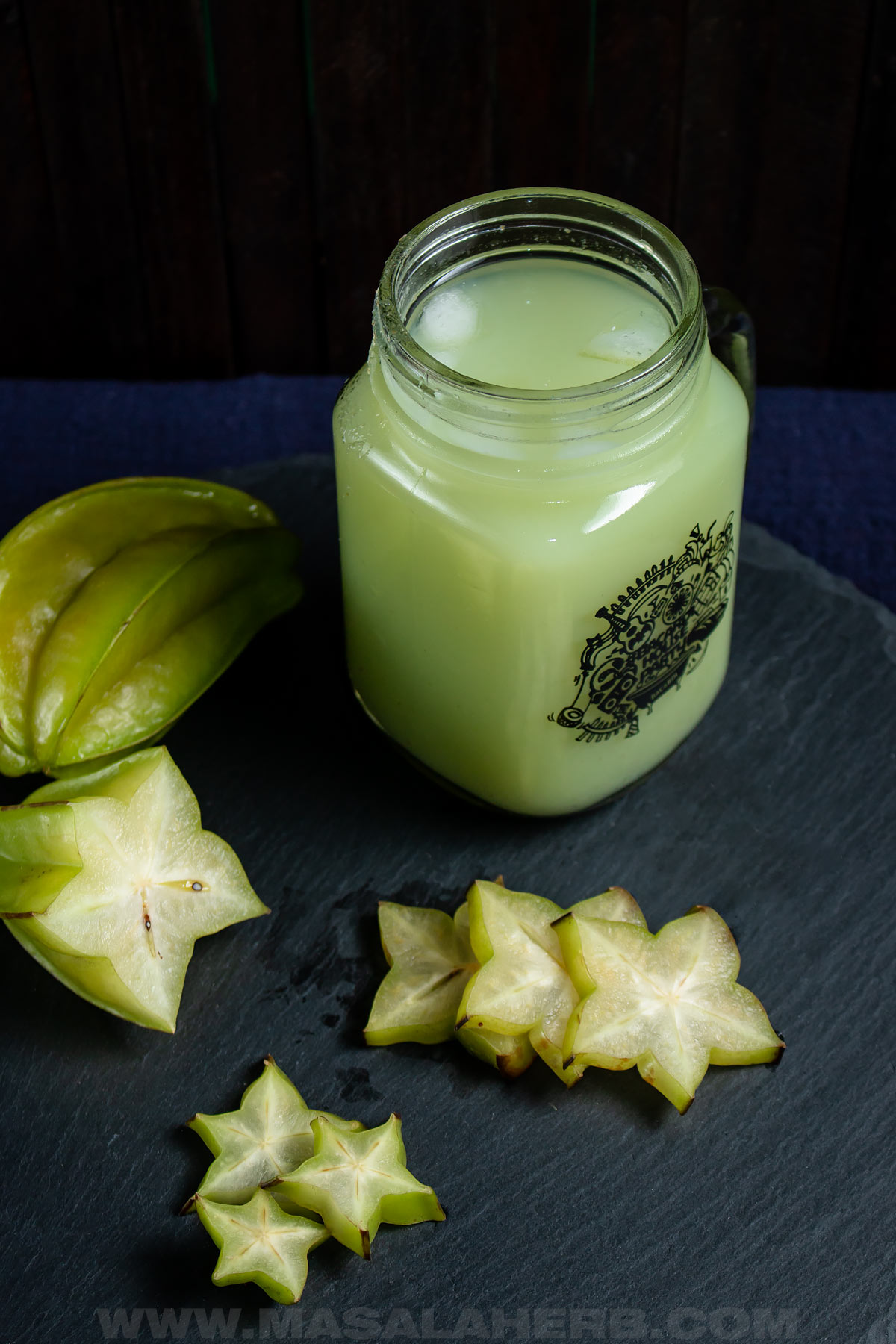 cut star fruit in slices with a juice