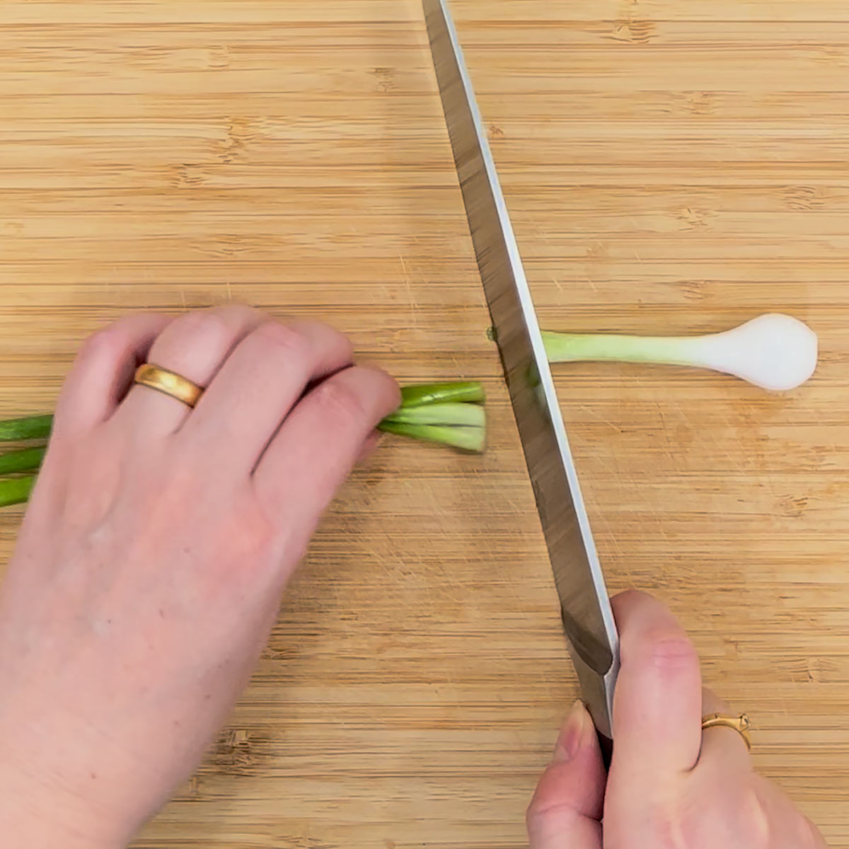 separate green onion stalk from the bulb