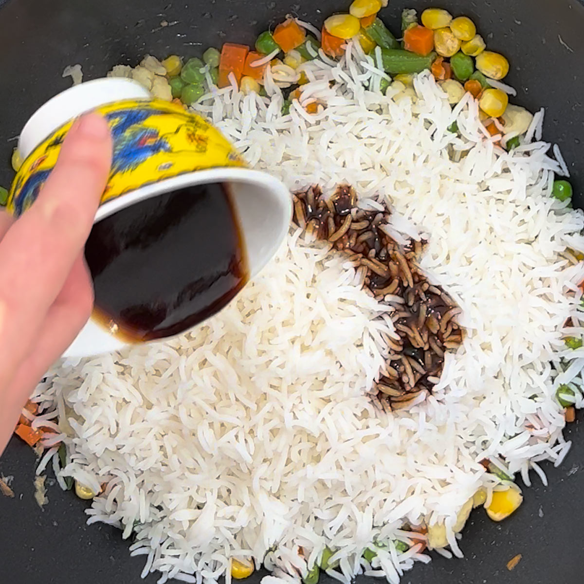 pour stir-fry sauce over rice