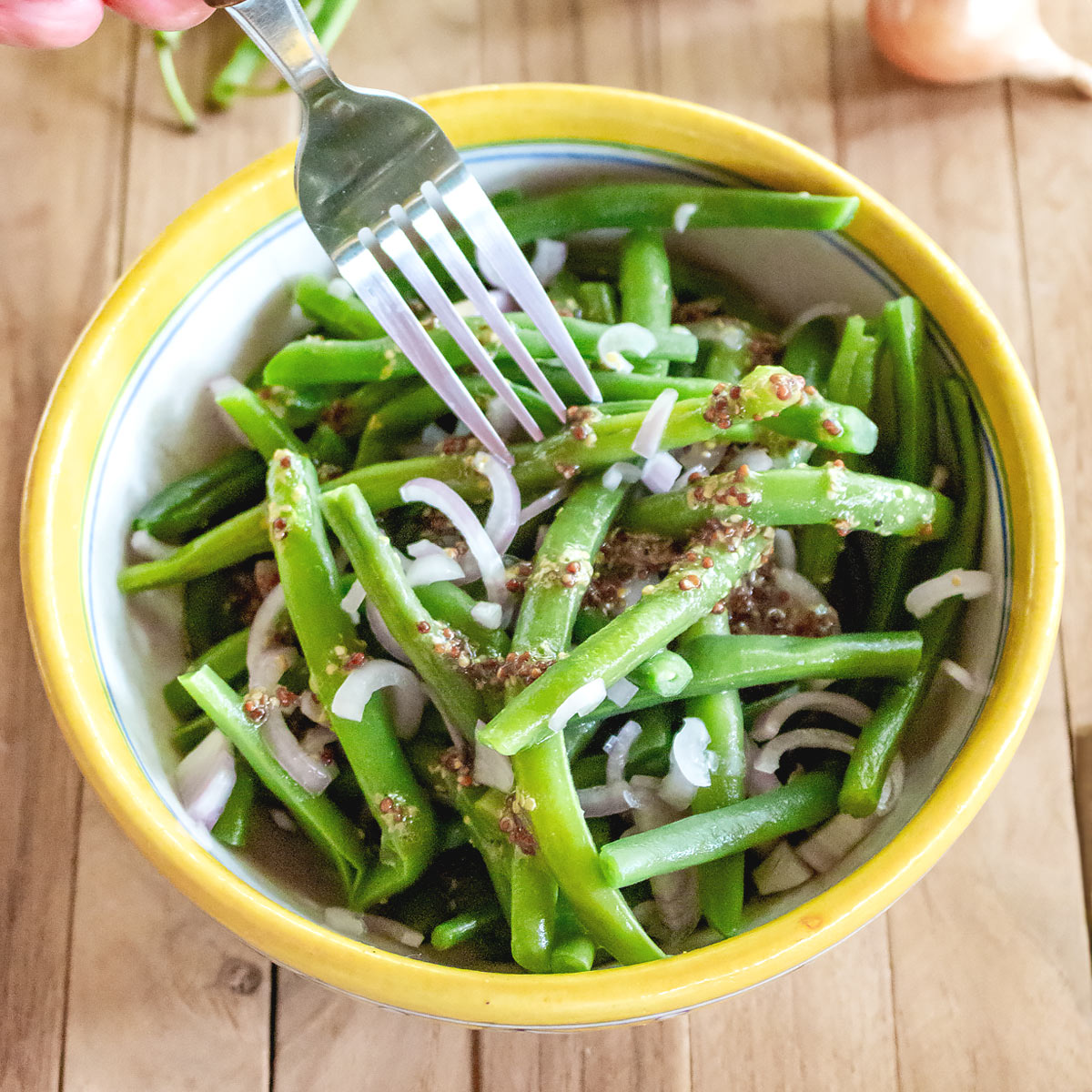 cold green bean salad in a bowl
